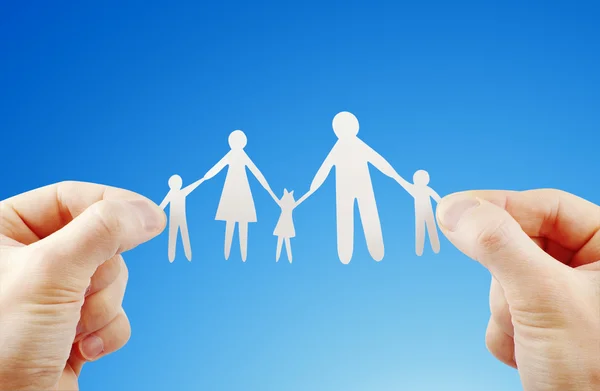 Paper family in hands — Stock Photo, Image