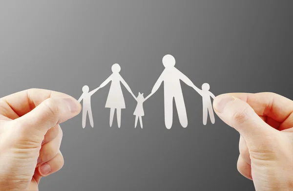 Paper family in hands — Stock Photo, Image