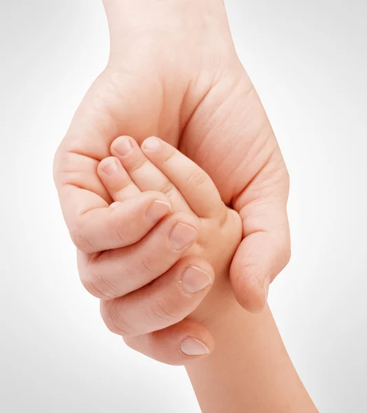 Mother holding child's hand — Stock Photo, Image