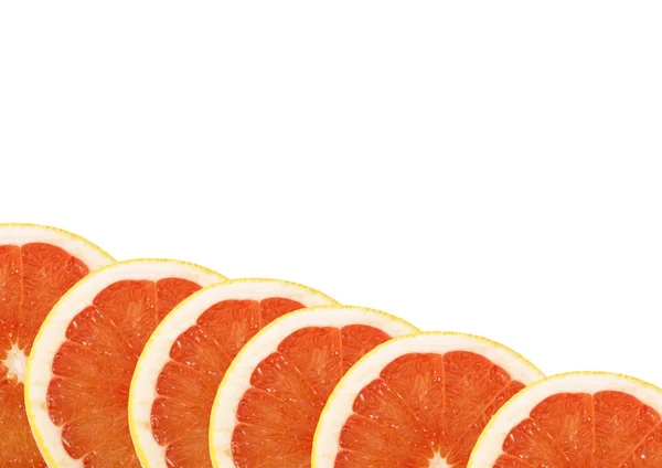 成熟的红葡萄柚隔离在白色背景上切片 — 图库照片
