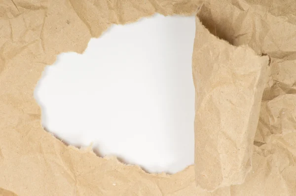 Ripped white paper against a white background — Stock Photo, Image