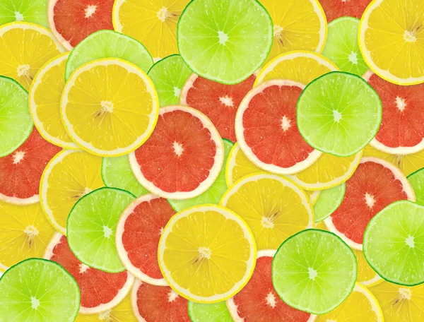 Abstract background of citrus slices — Stock Photo, Image