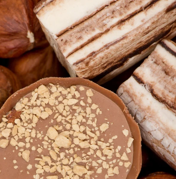 Closeup of coffee beans, cinnamon and nuts — Stock Photo, Image