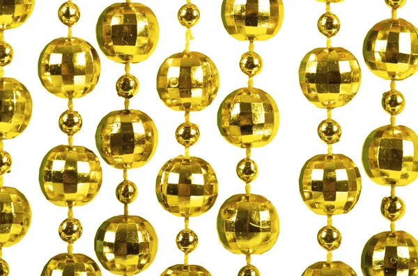 Background made of a brilliant celebratory beads of golden color — Stock Photo, Image