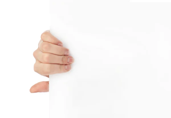 Reklama: Ruka drží bílý prázdný papír — Stock fotografie