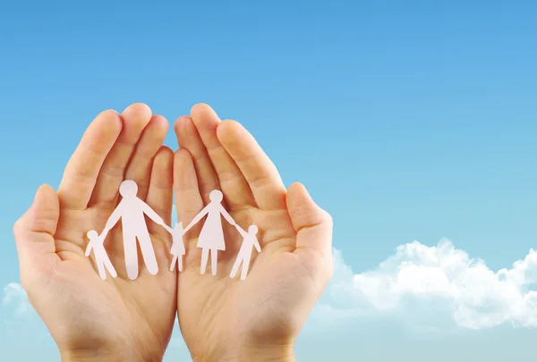 Paper family in hands — Stock Photo, Image