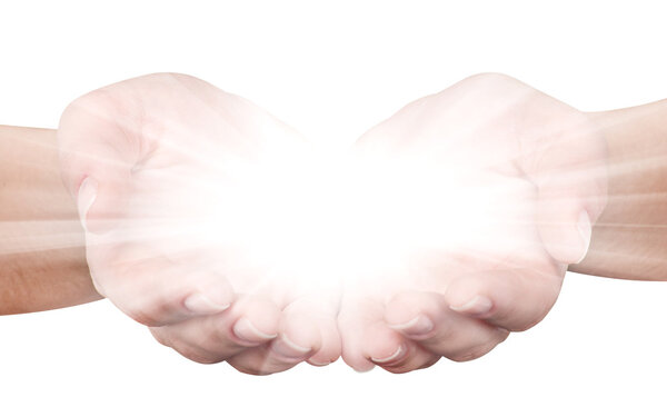 Holding hands open with glowing lights