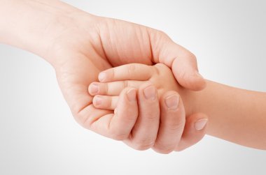 Holding çocuğun el anne