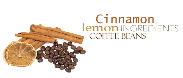 Coffee beans, cinnamon and lemon — Stock Photo, Image