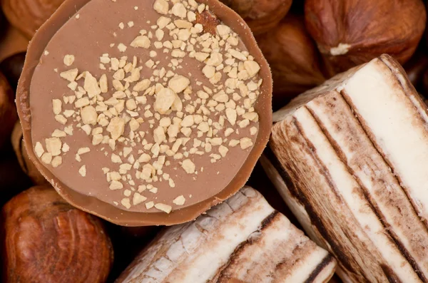 Closeup of coffee beans, cinnamon and nuts — Stock Photo, Image