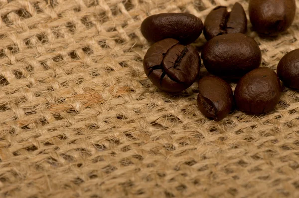 关于 （粗麻布袋咖啡豆) — 图库照片