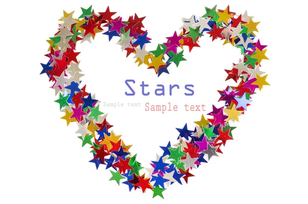 Grande coração composto por muitas estrelas coloridas em branco — Fotografia de Stock