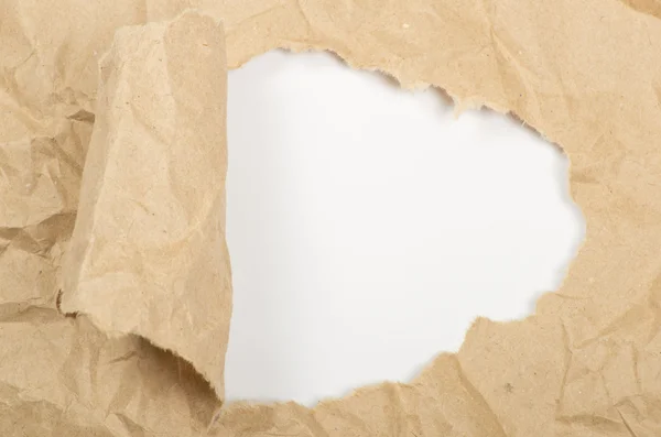 Ripped white paper against a white background — Stock Photo, Image