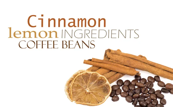 Coffee beans, cinnamon and lemon — Stock Photo, Image