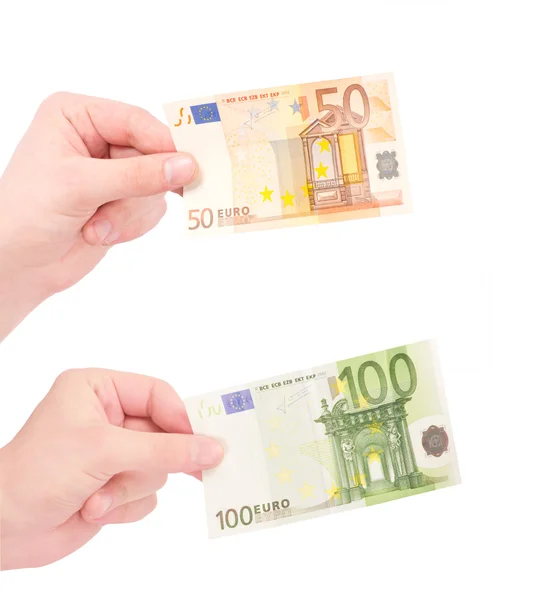 Гроші (євро) в руці, ізольованих на білому — стокове фото