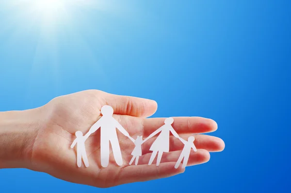 Paper family in hands — Stock Photo, Image