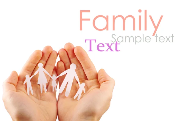 Papper familj i händerna isolerad på vit bakgrund — Stockfoto