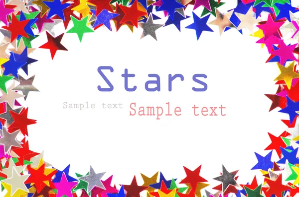 Confiti en forma de estrella de diferentes colores marco — Foto de Stock