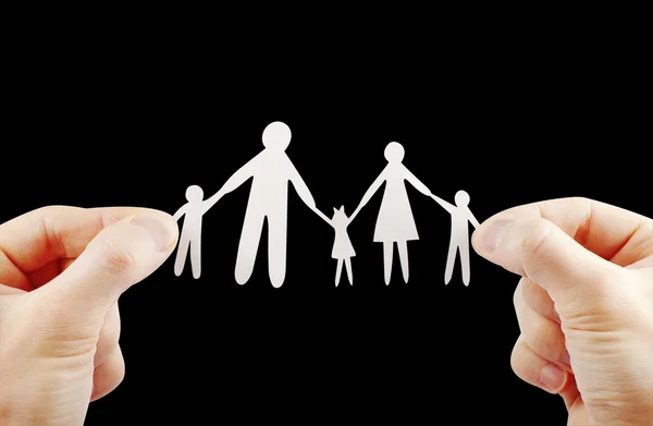 Paper family in hands — Stock Photo, Image