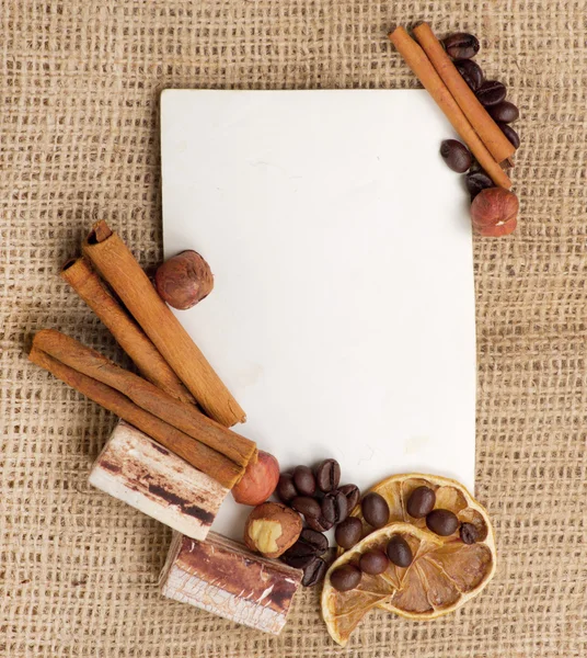 Old paper for recipes and spices on burlap closeup — Stock Photo, Image