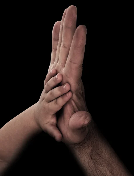 Mano del bebé con la mano del padre — Foto de Stock