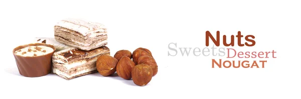 Čokoláda a ořechy nad bílá — Stock fotografie