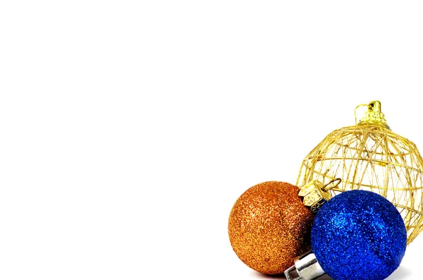 Cartão de Natal. Três esferas em um fundo branco — Fotografia de Stock