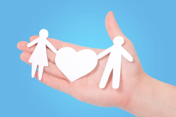 Paper family in hands — Stock Photo, Image