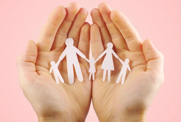 Paper family in hands — Stock Photo, Image