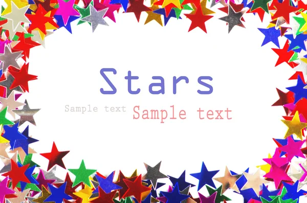 Star shaped confetti of different colors frame — Stock Photo, Image