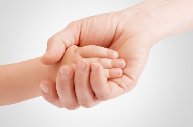 Holding çocuğun el anne