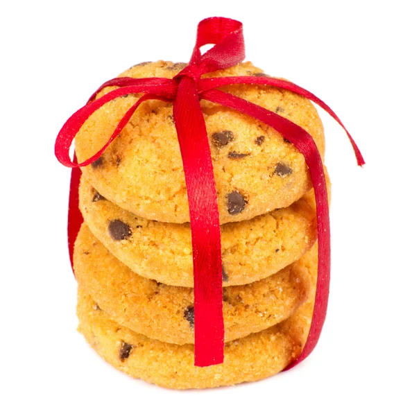 Čokoládové chipsy cookies s červenou stužku — Stock fotografie