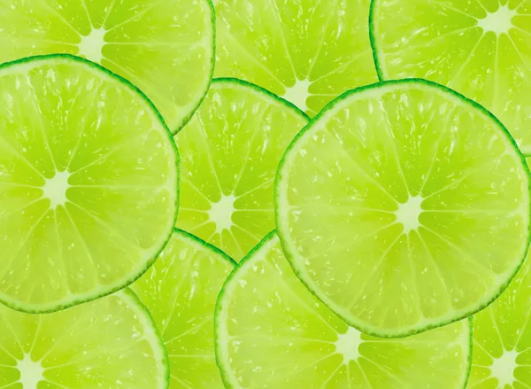 Lime skivor bakgrund — Stockfoto