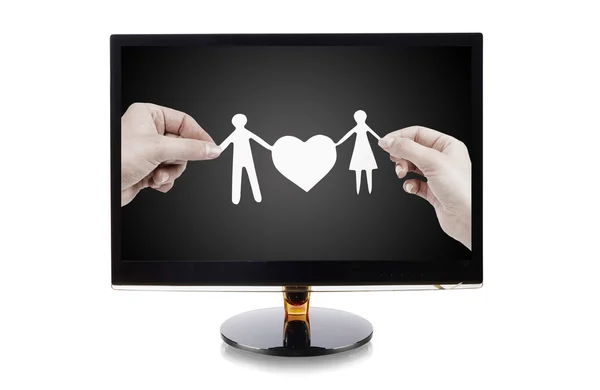 Monitor mit Papierfamilie in den Händen isoliert auf weiß — Stockfoto
