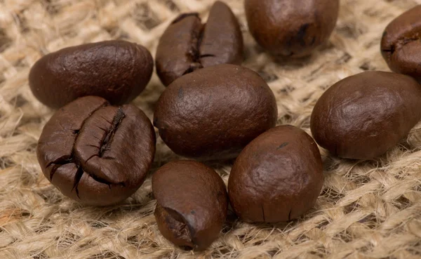 Coffee beans on sack(burlap) — Stock Photo, Image