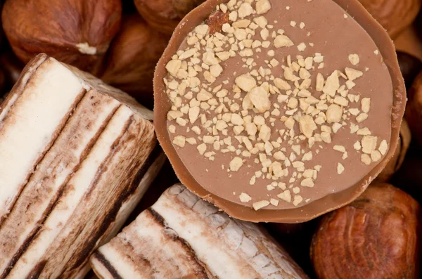 Closeup of coffee beans, cinnamon and nuts — Stock Photo, Image