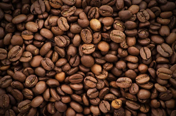 Hnědá káva, texturu pozadí, zblízka — Stock fotografie