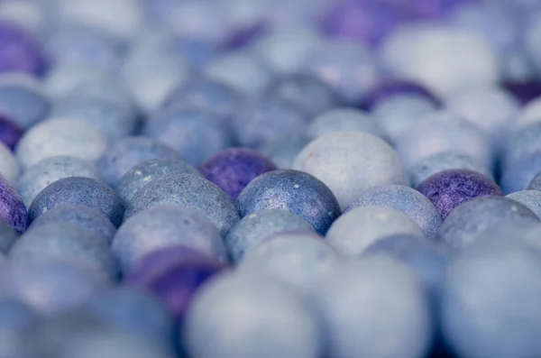 Color beads focused at center — Stock Photo, Image