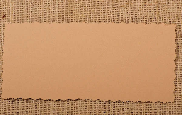 Oud papier tag op natuurlijke jute — Stockfoto