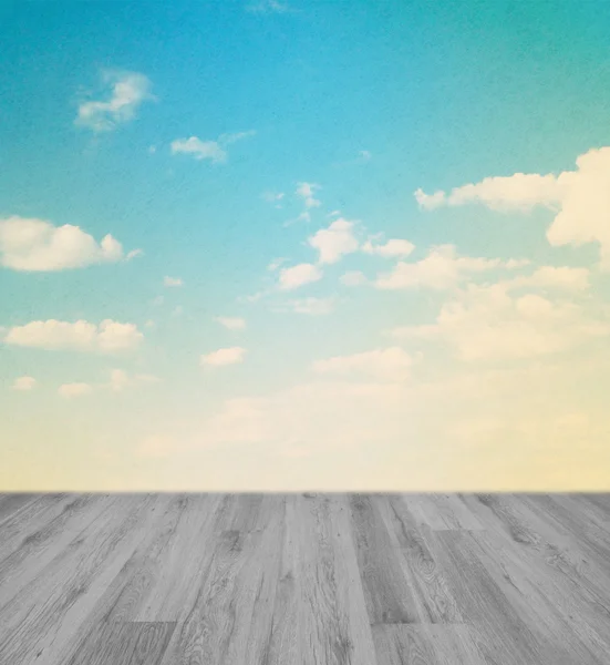 Wood floor with retro sky background — Stock Photo, Image