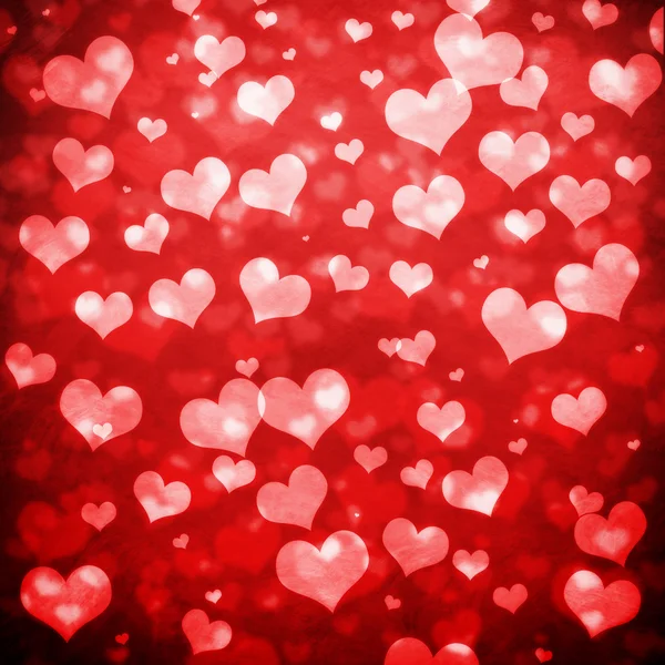 Lesklé srdce bokeh světle Valentýna pozadí — Stock fotografie