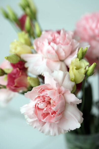 Bouquet with pink carnations and eustoma