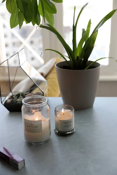Candles Glass Jars Gray Table — Stock Photo, Image