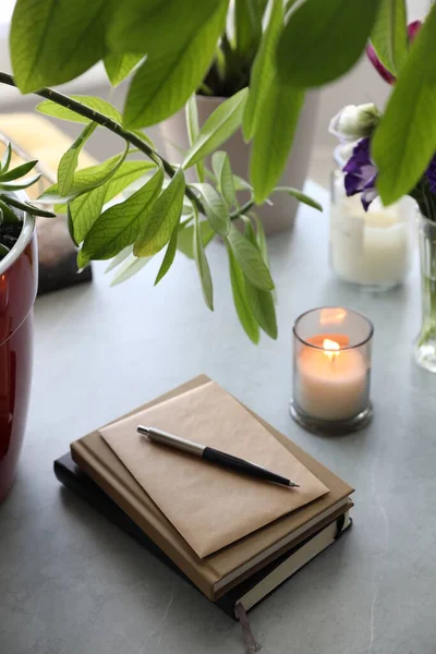 Notebooks Flowers Candle Table — Stock Photo, Image