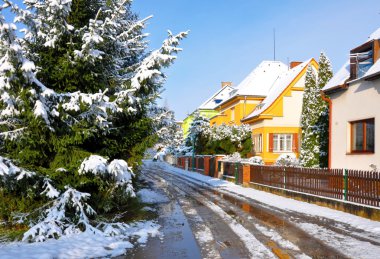 Muddy street in winter clipart