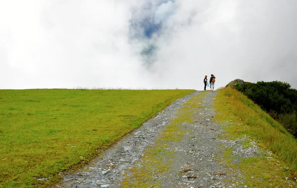 Tourist in den Alpen — Stockfoto