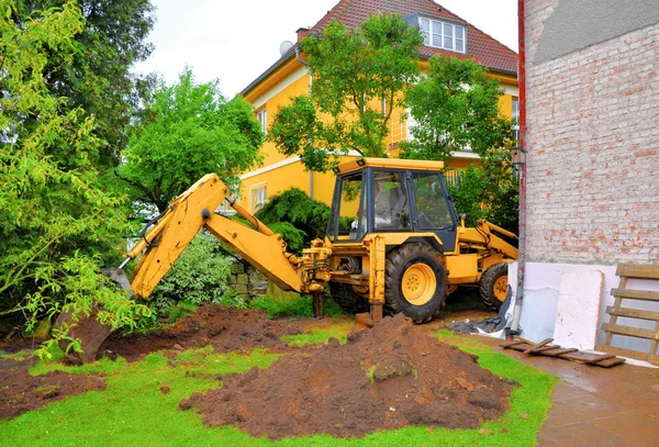 Graven graafmachine — Stockfoto