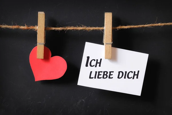 Heart with ich liebe dich poster hanging — Stock Photo, Image