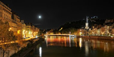serene view of Saone river at night clipart