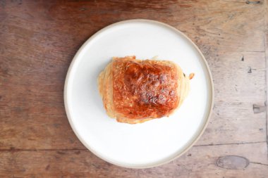 Kruvasan, Fransız kruvasanı, Fransız ekmeği ya da ekmek.